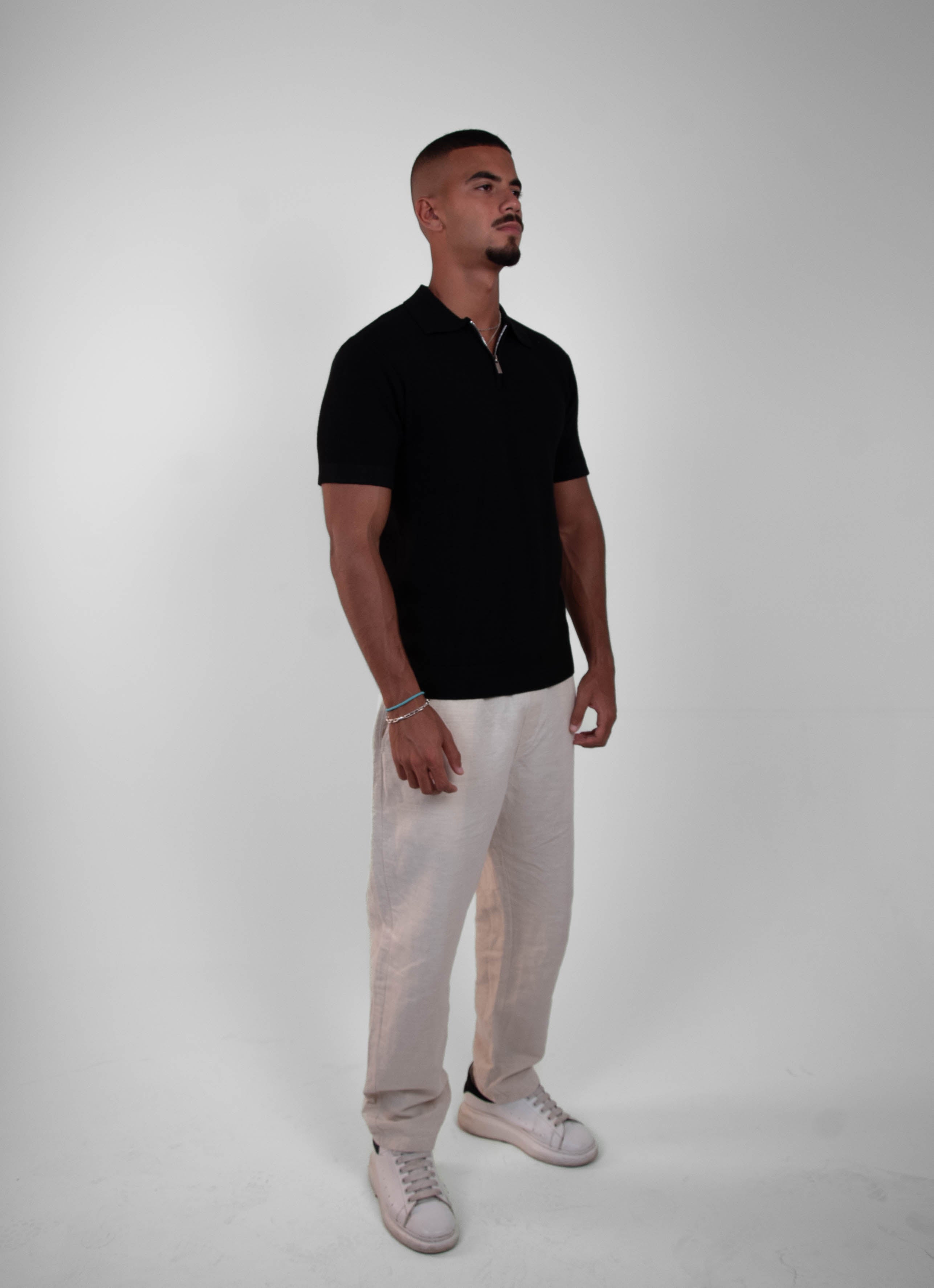 BLACK KNIT ZIP-UP POLO