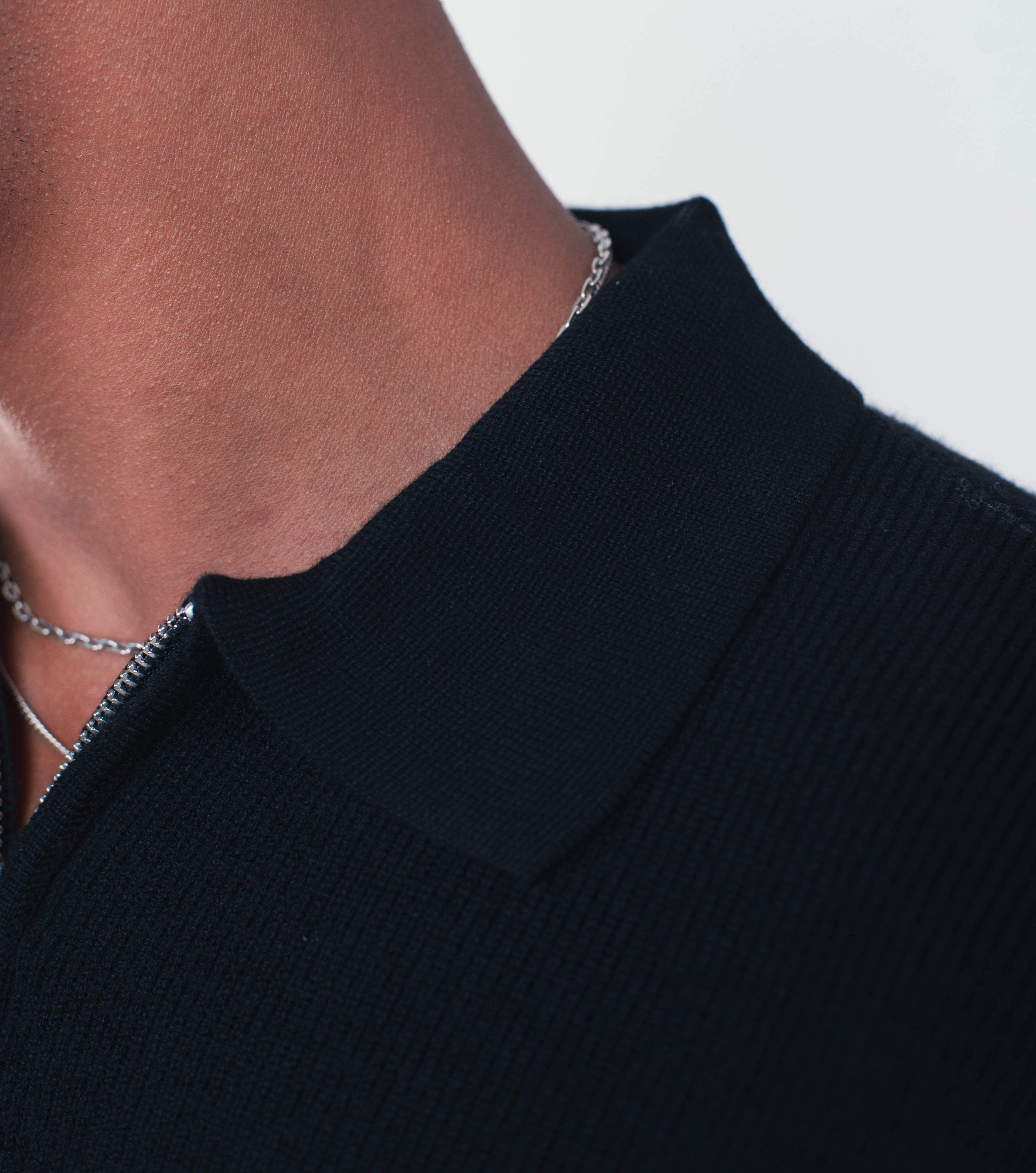 BLACK KNIT ZIP-UP POLO